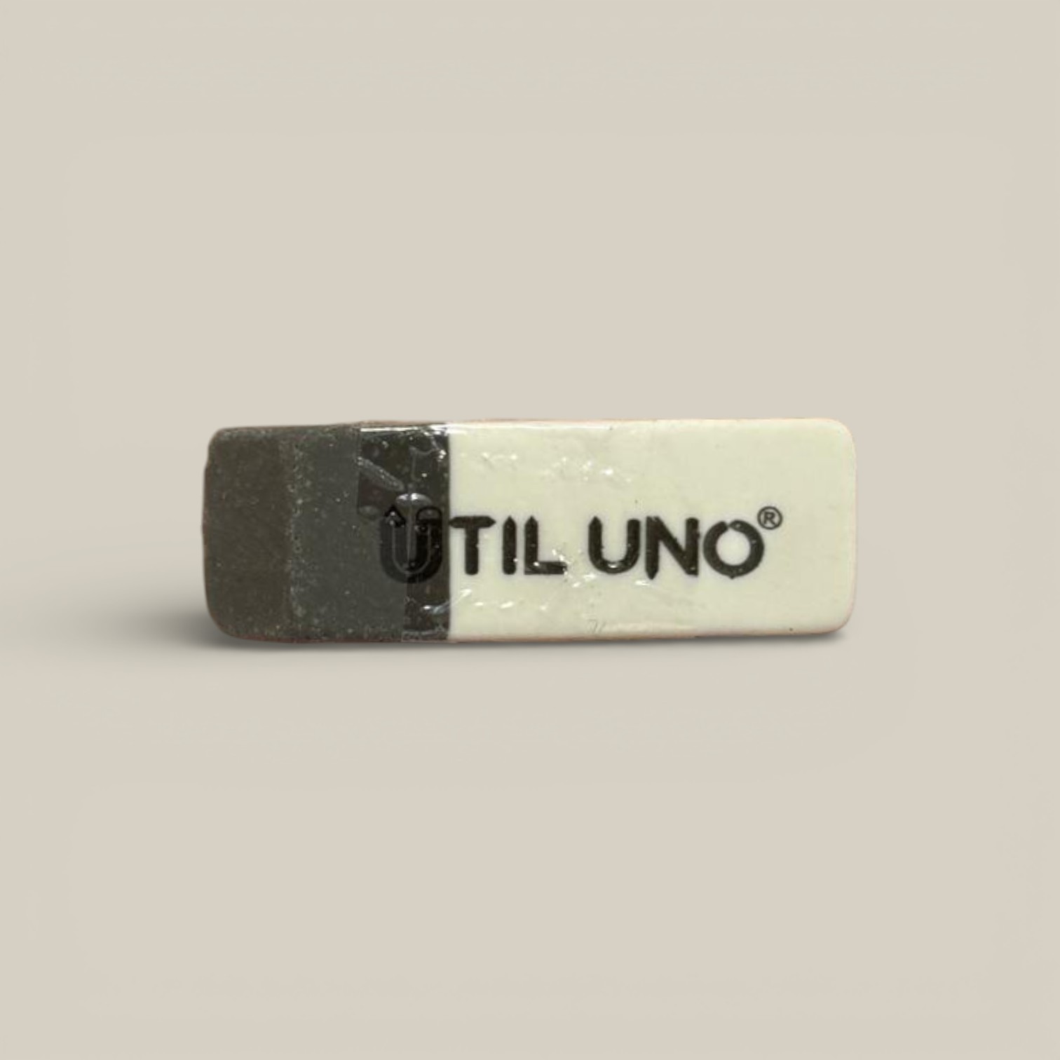 Goma de borrar util uno gris y blanca
